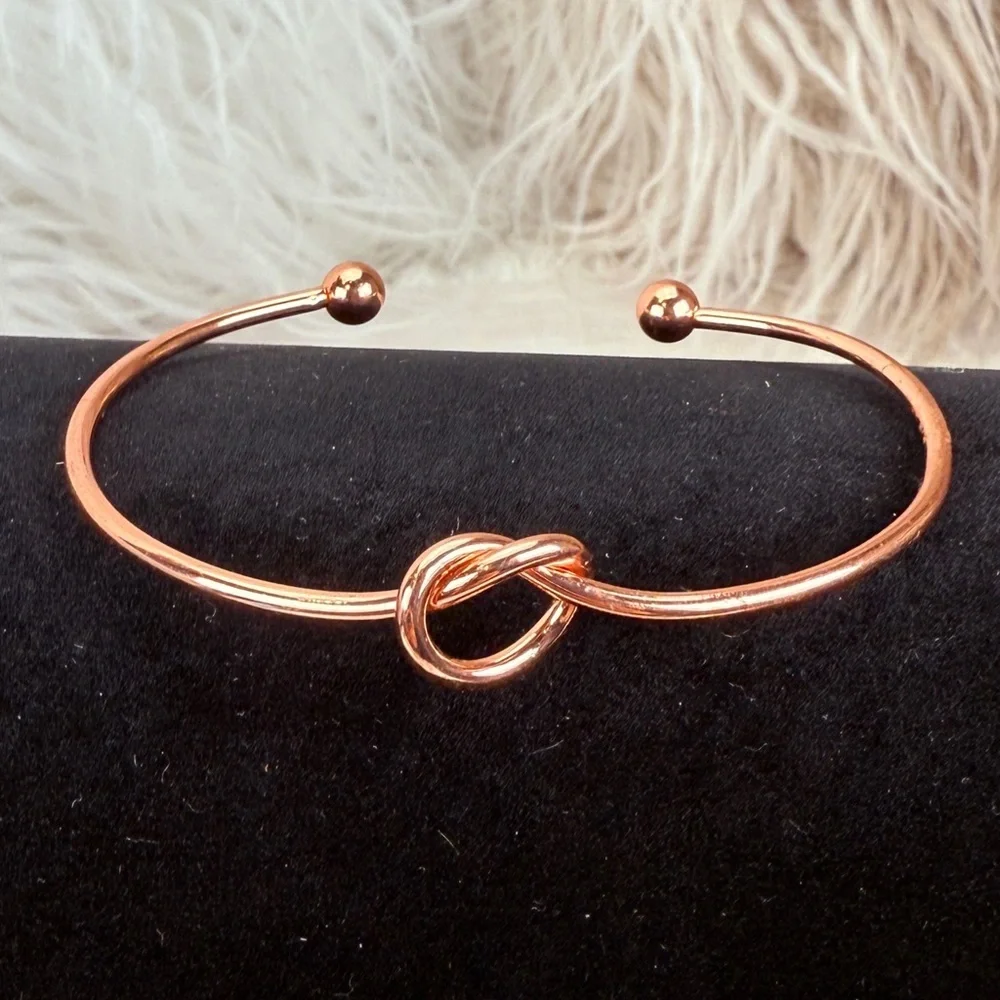 Pretty rose goldtone knotted minimalist cuff bracelet